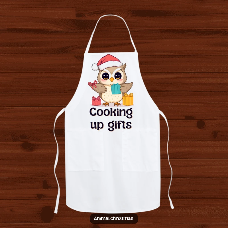 Funny apron showing a cute owl in a Santa hat, ready for holiday baking and gift-giving tasks.