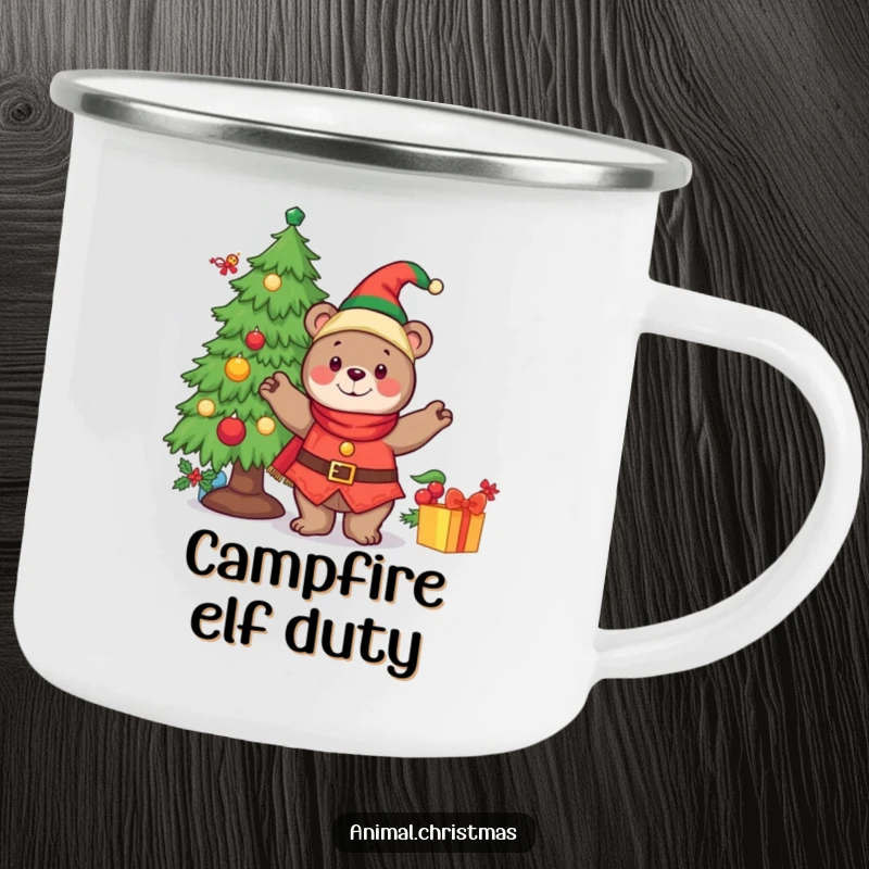 Funny camping mug with a cheerful bear dressed as an elf, decorating a Christmas tree during an outdoor trip.