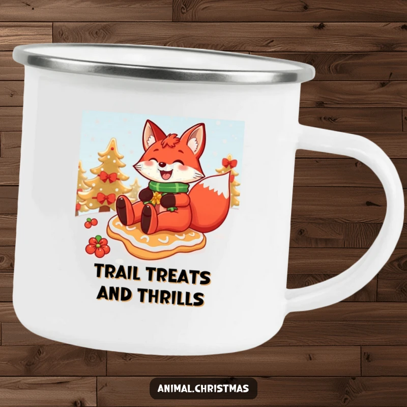 Funny Christmas camping mug featuring a red fox grinning widely while sliding down a snowy hill on a festive gingerbread cookie.