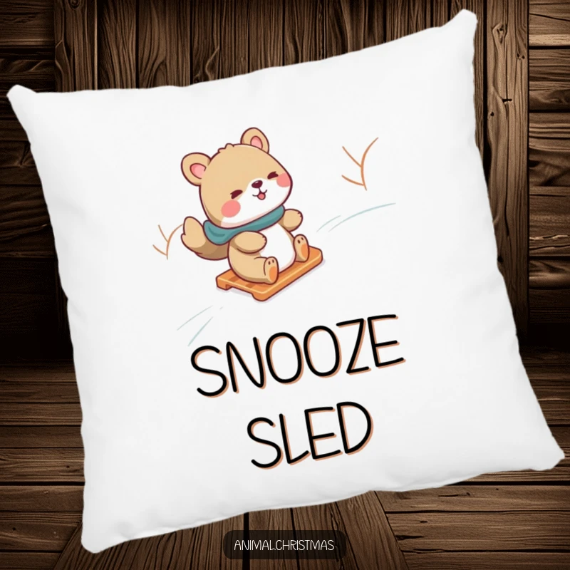 Funny pillow featuring an animal gleefully sliding down a snowy hill on a sled, adding cozy winter adventure.