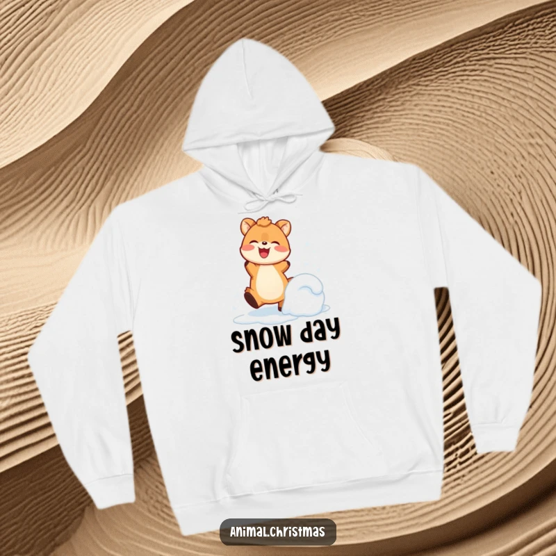 Funny Hoodie: An animal joyfully kicks up snow, radiating happiness and energetic winter fun.