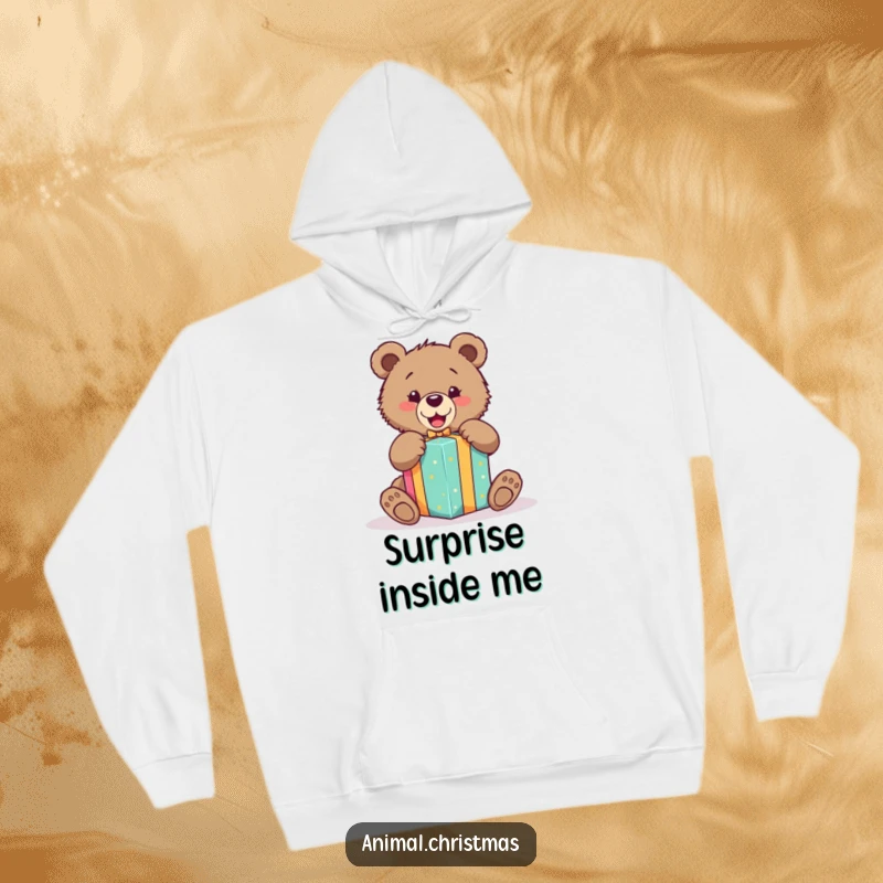 Funny hoodie of an excited bear cub eagerly unwrapping a vibrantly colored gift, perfect for staying warm and happy.