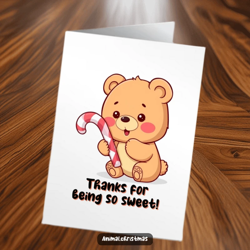 Funny Free Printable Thank You Card: A happy bear cub proudly presents a colorful candy cane as a token of thanks.