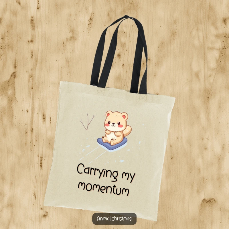 Funny Tote Bag: A whimsical animal is captured mid-slide down a snowy hill, bringing animated humor to your everyday carry.