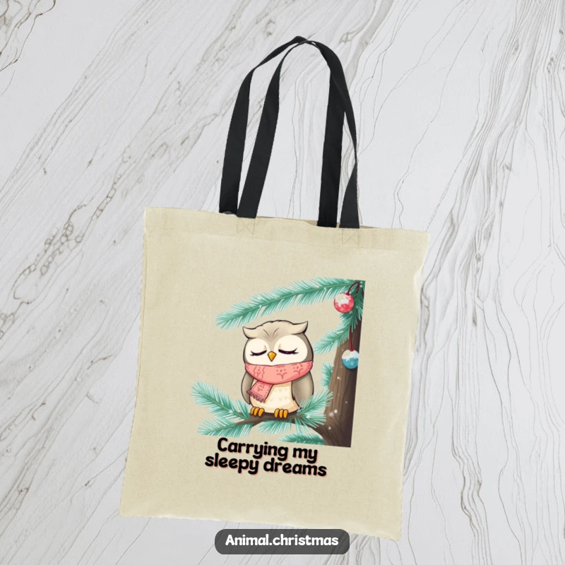 Funny Christmas tote bag featuring a sleepy owl wearing a knitted scarf, nestled inside a frosted pine tree.