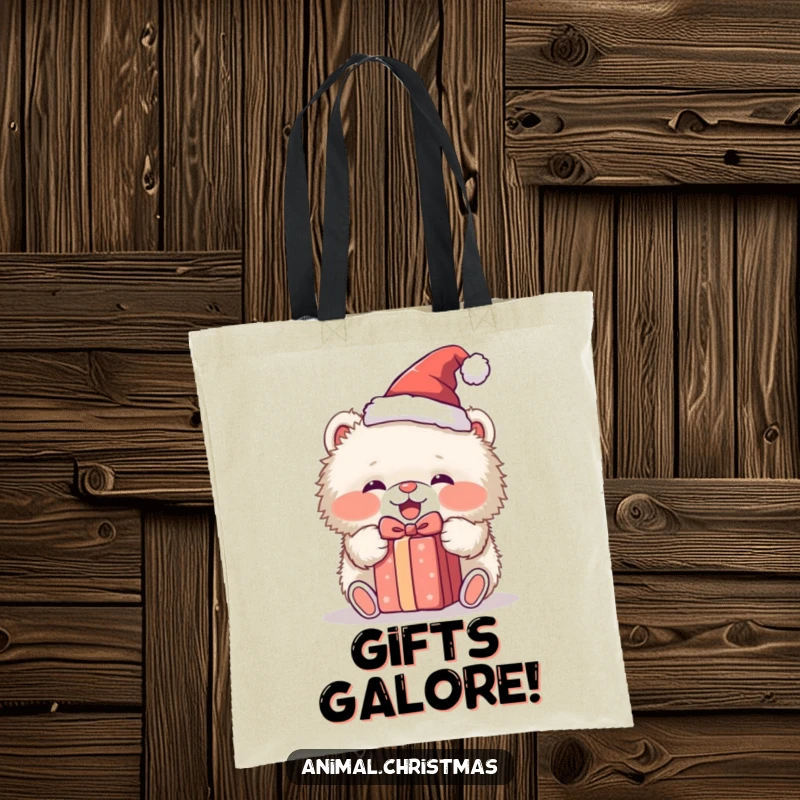 Funny tote bag showcasing a fluffy animal with a Santa hat, excitedly unwrapping a present, ideal for stylish and humorous shopping.