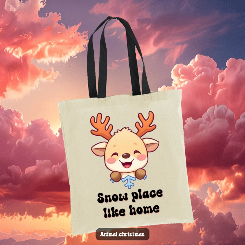 Funny tote bag showcasing a cute animal with antlers, gleefully peeking from behind a snowflake, symbolizing festive cheer and practicality.